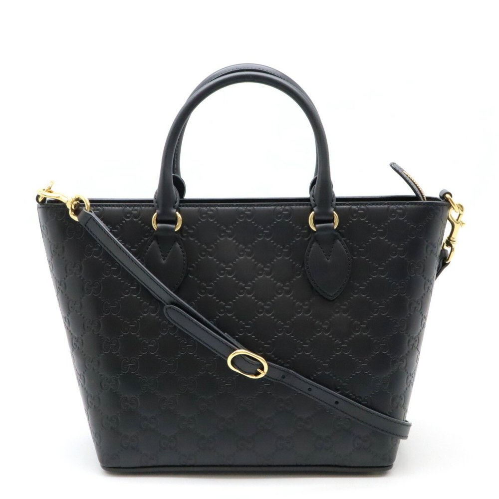 Gucci Black Shoulder Bag with Gold Accents